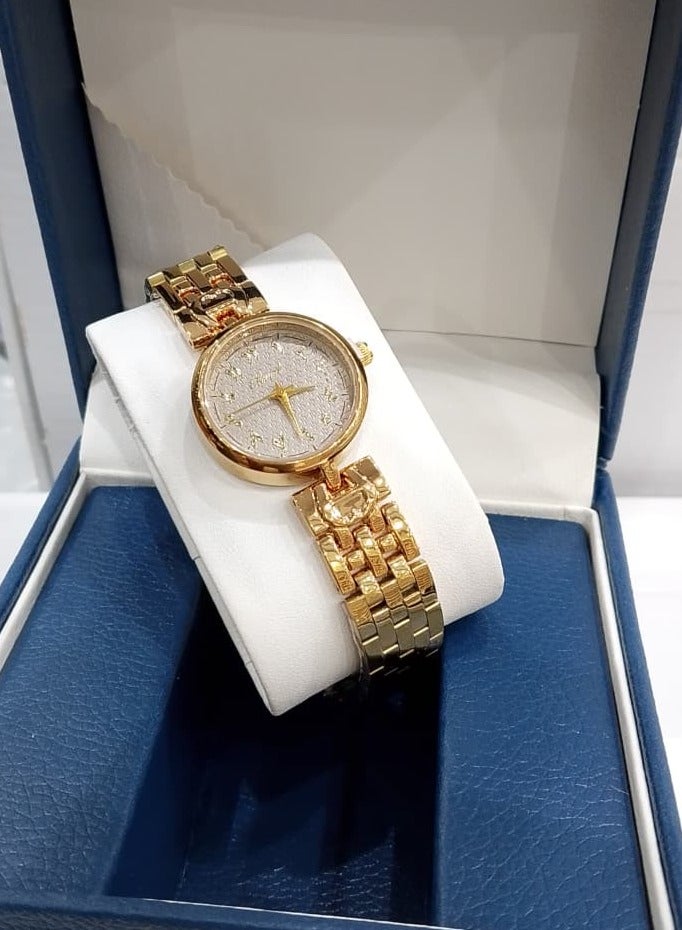 Women's watch adorned with crystals, featuring an elegant and luxurious design.